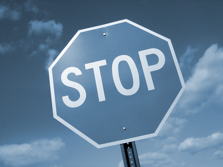 Stop sign on a blue background