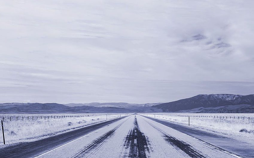 Snowy road in the Montana Rockies 