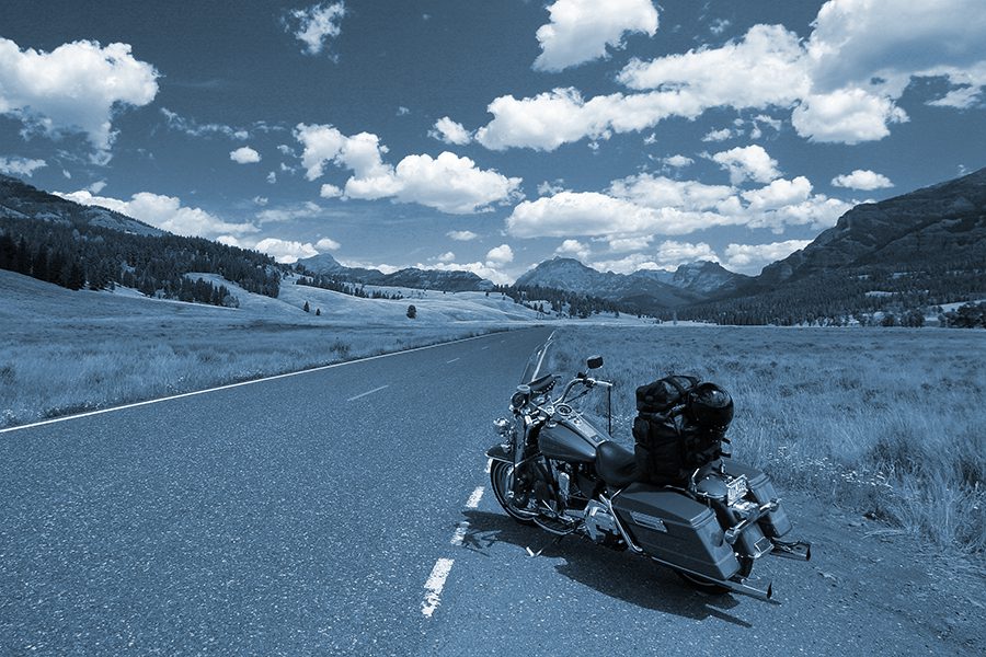 Motorcycle on the side of a country road in Montana