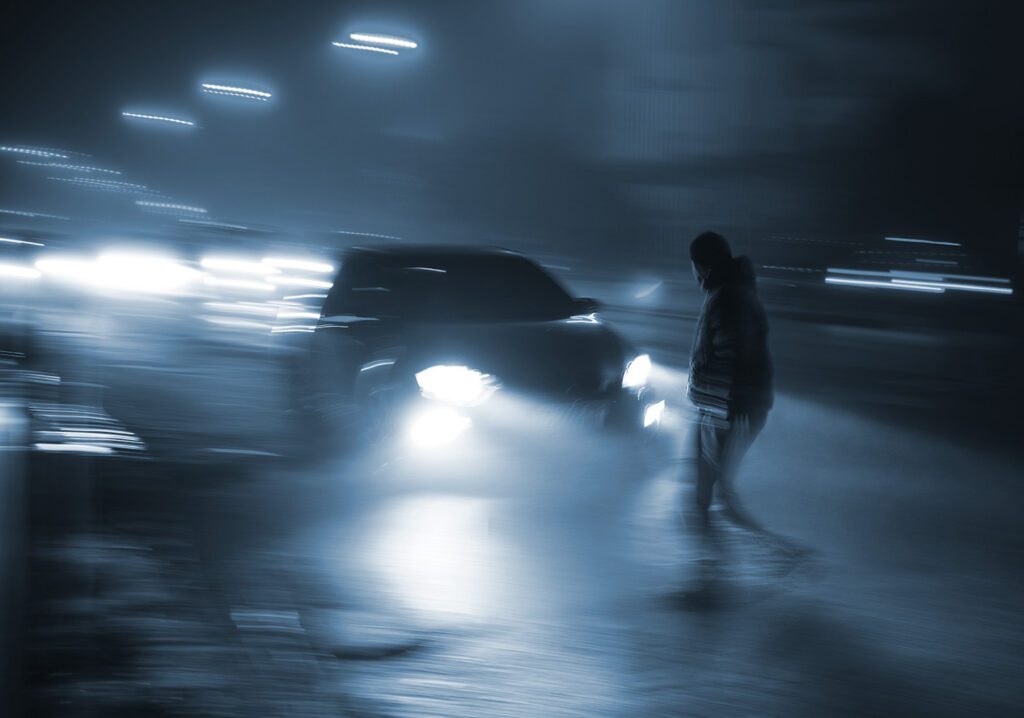 Dangerous situation on zebra crossing. Intentional motion blur