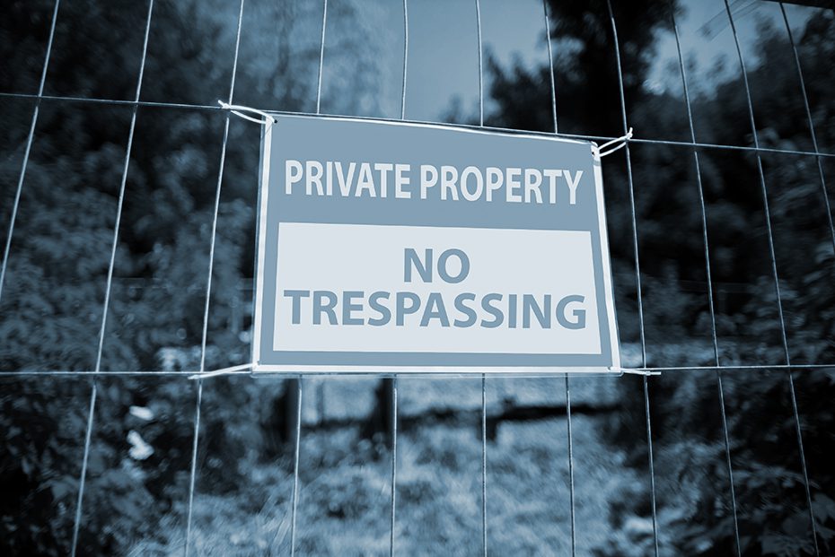 private property sign on a forested property