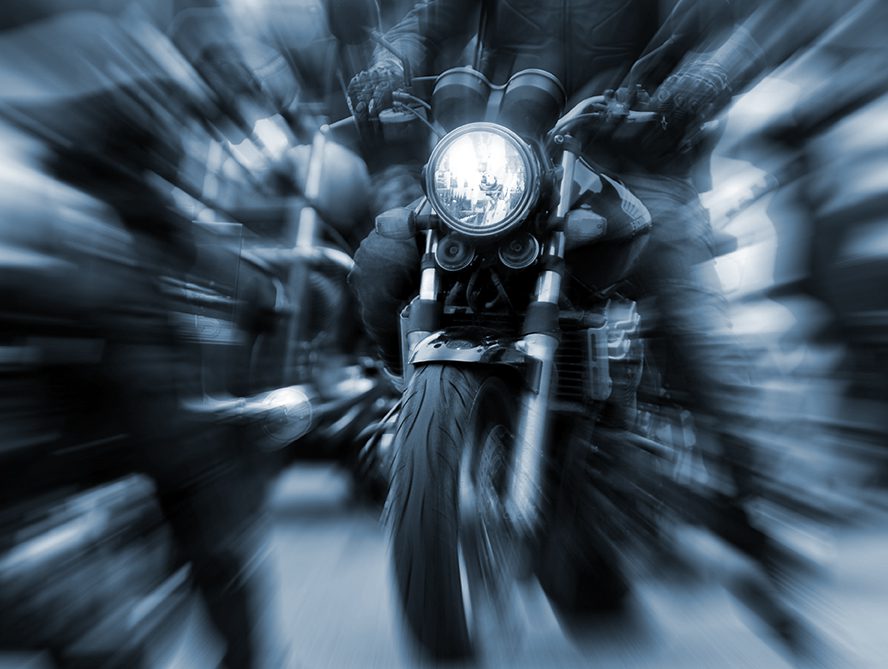 motorcycle in an extreme foreground blur