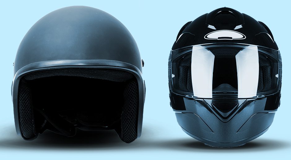 Motorcycle helmets on a light blue background