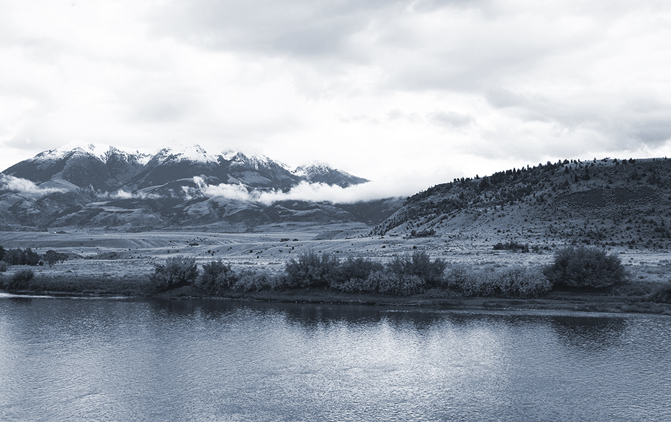 Lake with Mountains in the background off of King's hill Scenic Byway in Montana