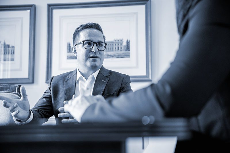 Attorney discusses a car accident case with client