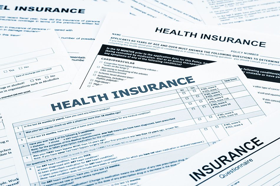 health insurance form, paperwork and questionnaire for insurance concepts