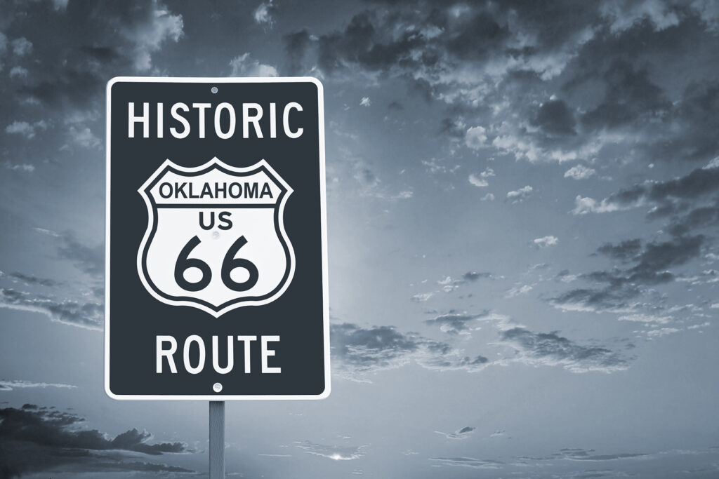 Historic Oklahoma Route 66 Brown Sign with Sunset